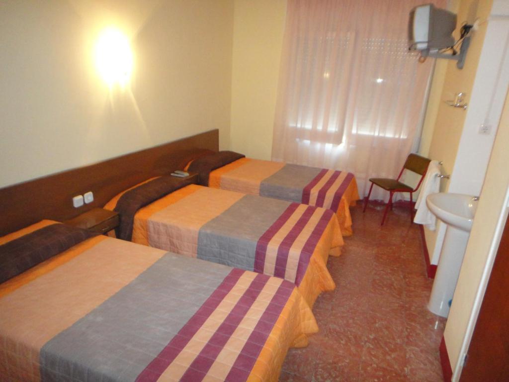 Habitación Triple con baño compartido